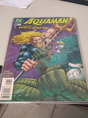 DC Comics Aquaman Comic Cover in Green and Teal Accents In A Sleeve